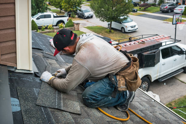 Professional Roofing technician working in Pingree, ID